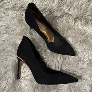 Black Michael Kors heels with rose gold details